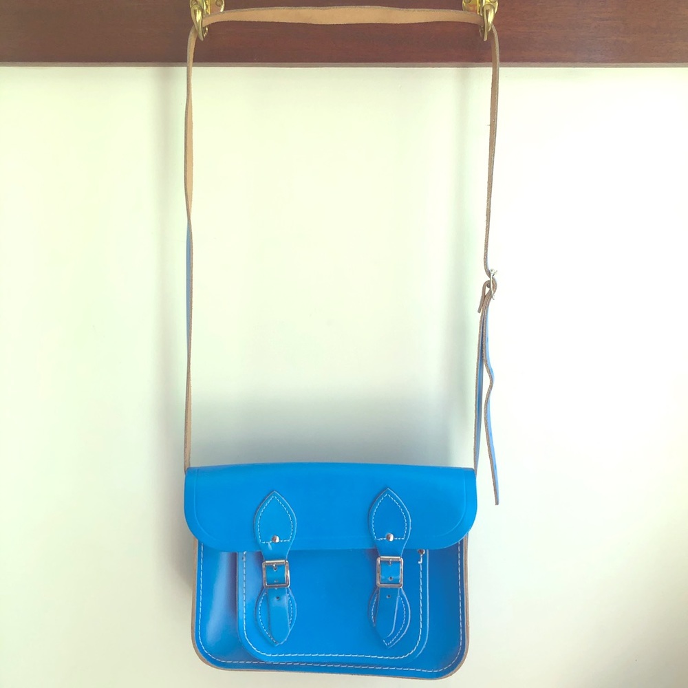 Hard leather turquoise messenger style handbag